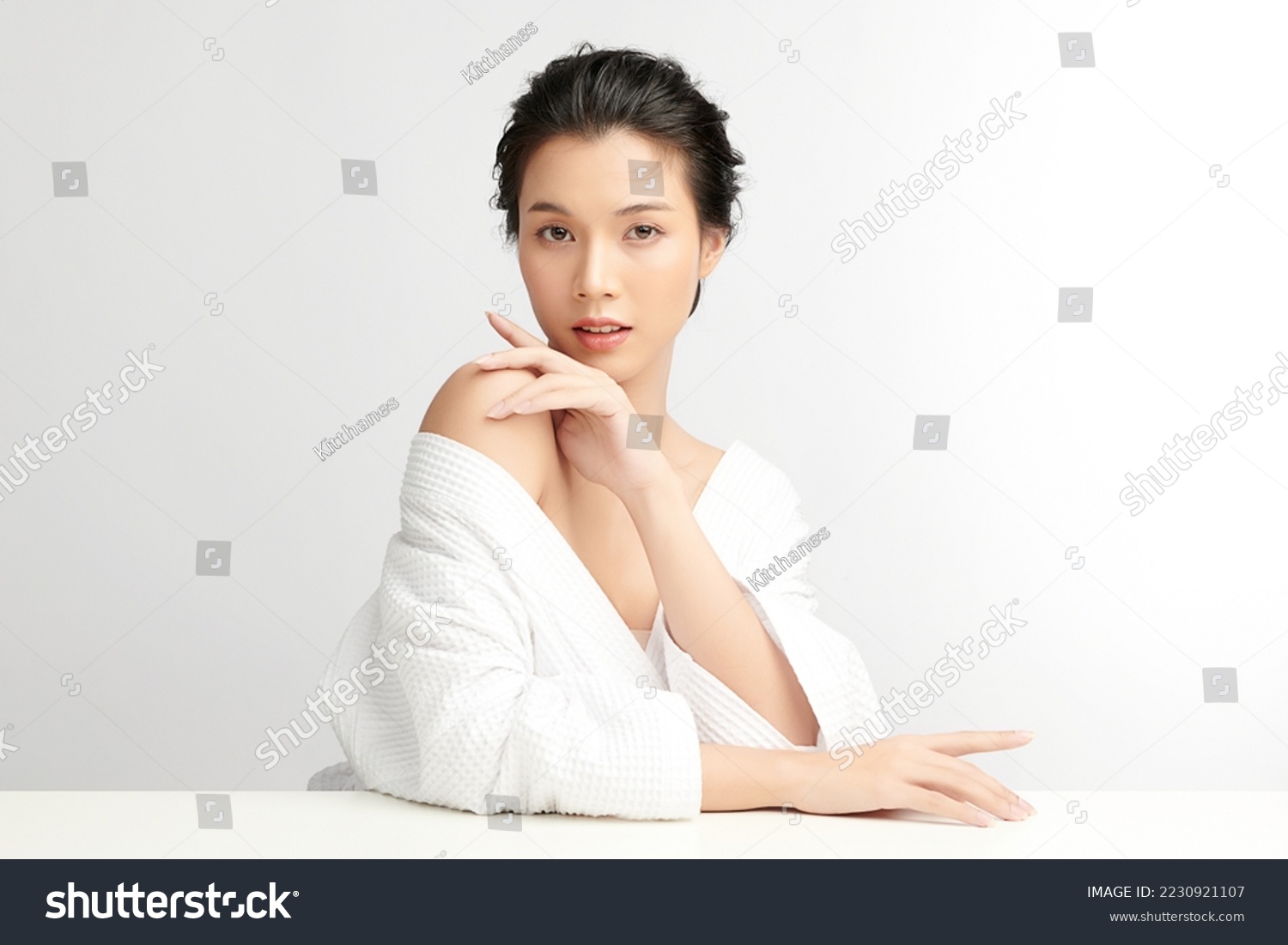 stock-photo-beautiful-young-asian-woman-with-clean-fresh-skin-on-white-background-face-care-facial-treatment-2230921107